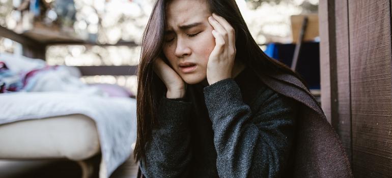 a woman having a headache
